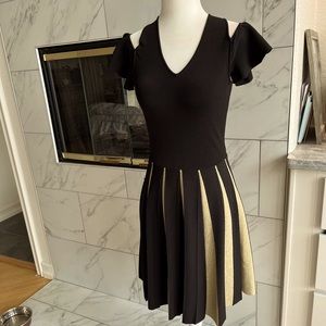 Black & Gold Ted Baker dress with bare shoulder